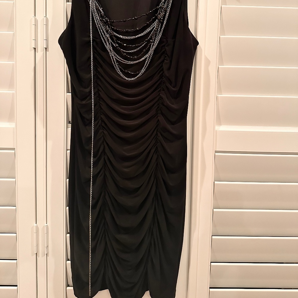 Black mini dress with attached chain necklace